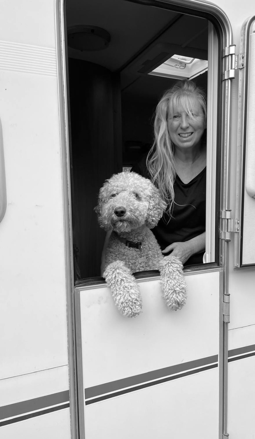Rebecca with dog and caravan